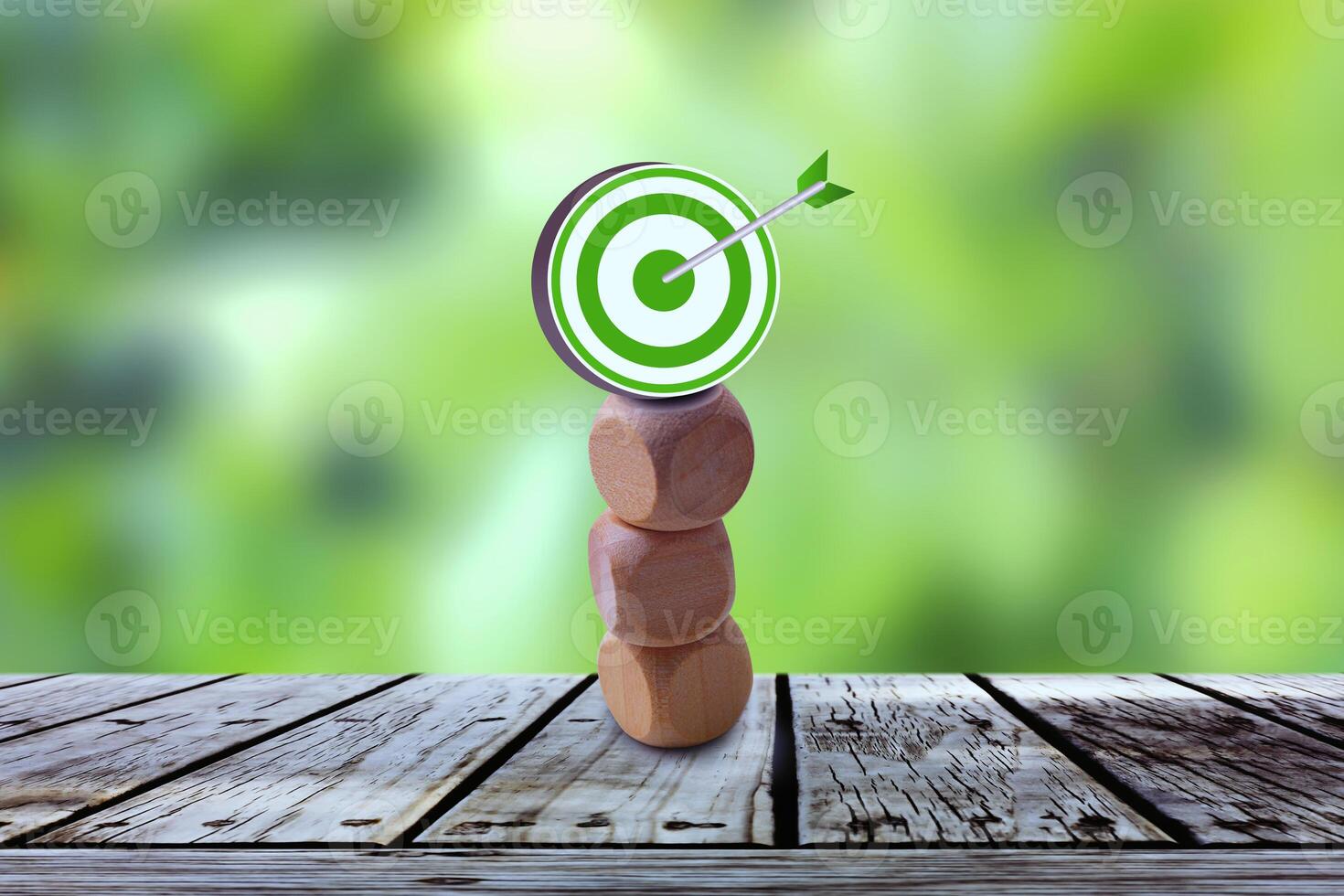 Cube wood with icon success on table green background. Goal and target, success and business target concept, project management, company strategy development. photo