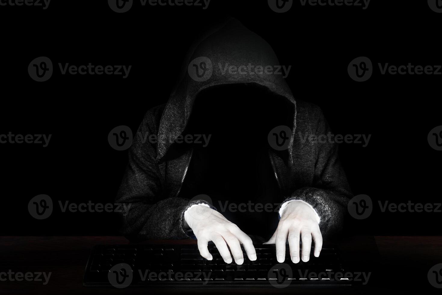 Computer hacker in hoodie, Virus infected software. photo