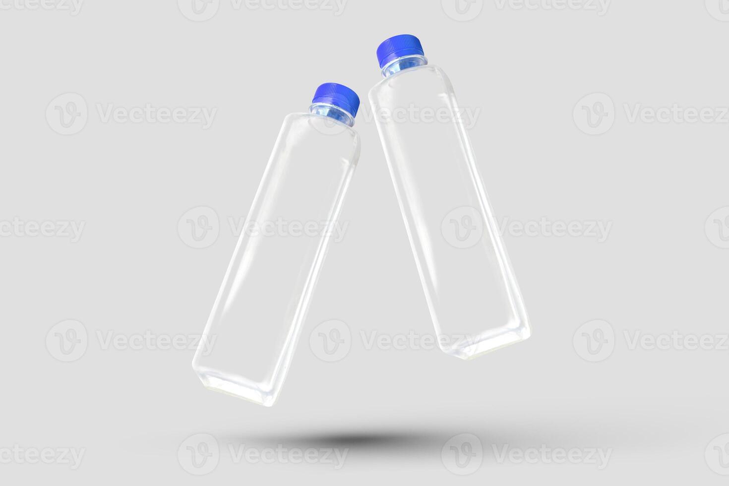 two empty plastic bottles with blue caps on a white background photo