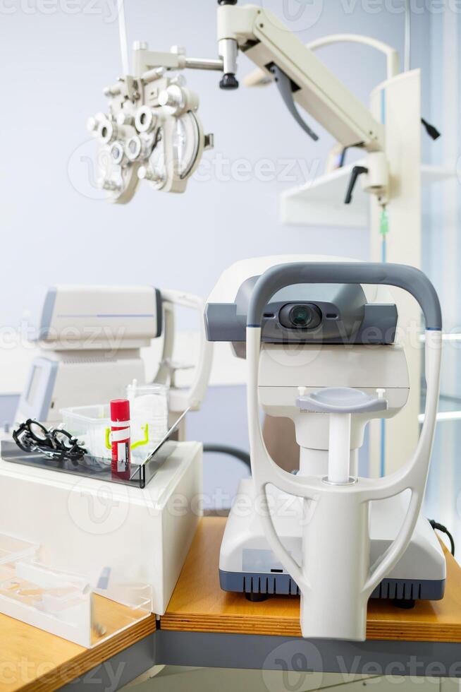 Microscopic apparatus for testing eyesight. Ophthalmology and treatment of eye diseases. Eye clinic, optometrist concept photo