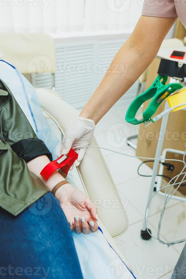 Apparatus for measuring heartbeat. A modern office for the ctg. photo