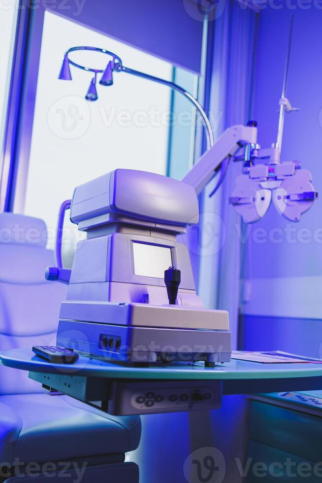 A modern microscope for vision testing in a light room. Microscope for vision correction. photo