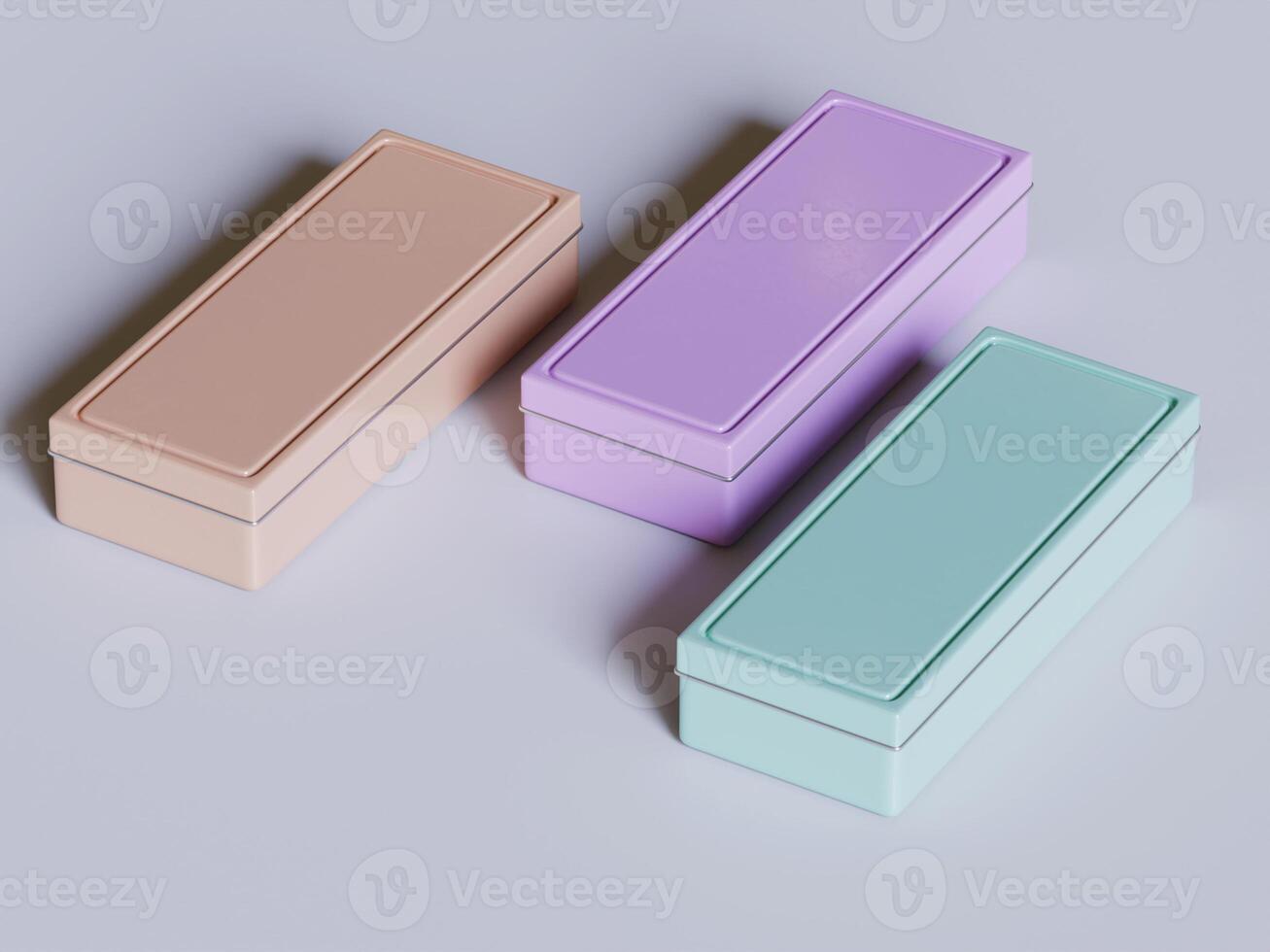 Three different colored boxes sitting on a table photo