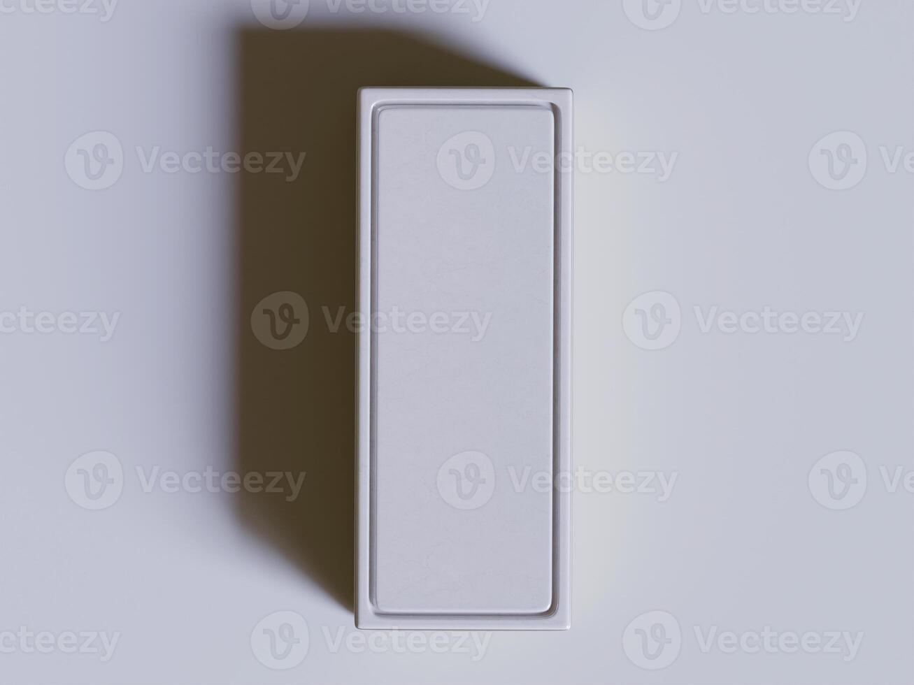A white box with a white lid on a gray background photo