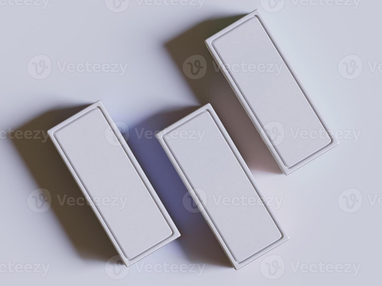 Three white boxes on a white surface photo