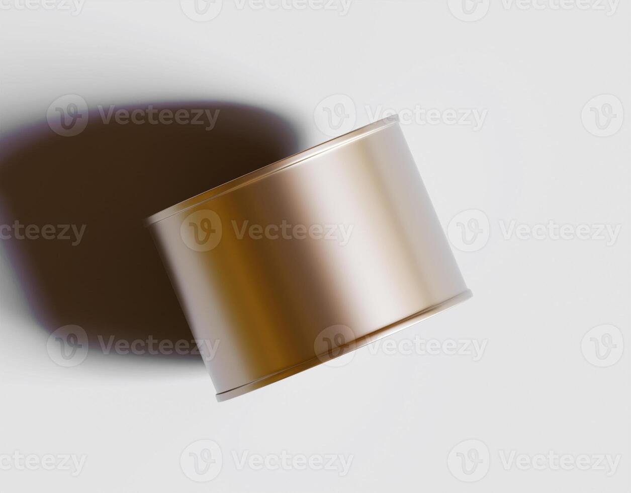 A metal cylinder sitting on a white surface photo