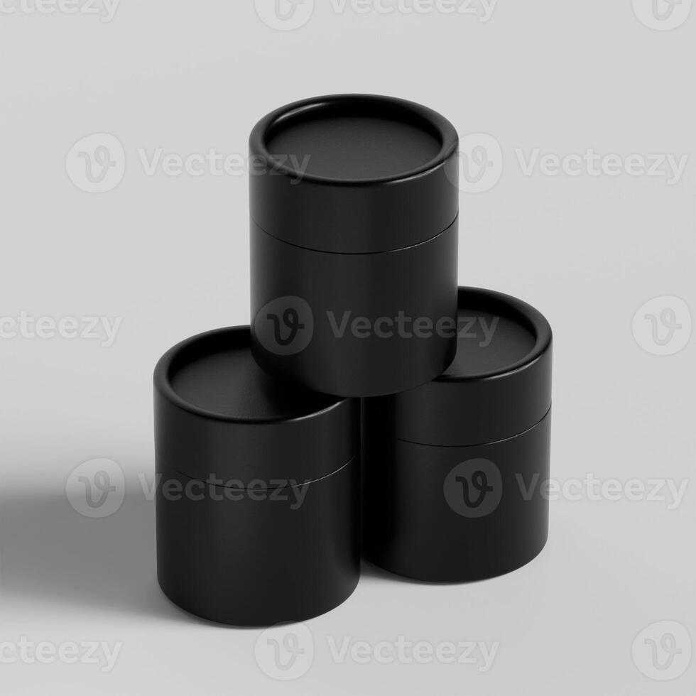 Three black containers with lids on a white surface photo