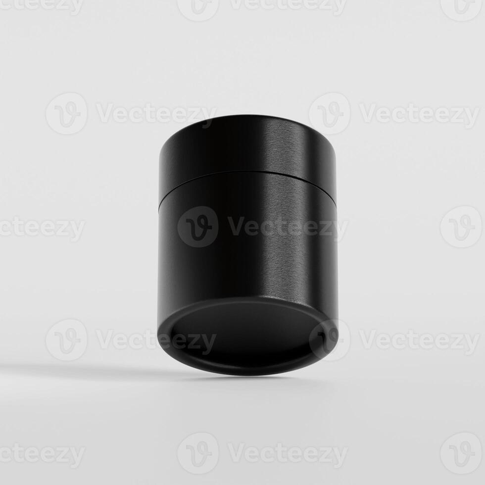 A black container with a lid on a white surface photo