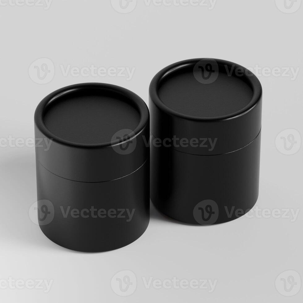 Two black containers with lids on a white surface photo
