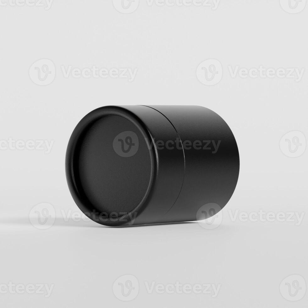 A black container with a lid on a white surface photo