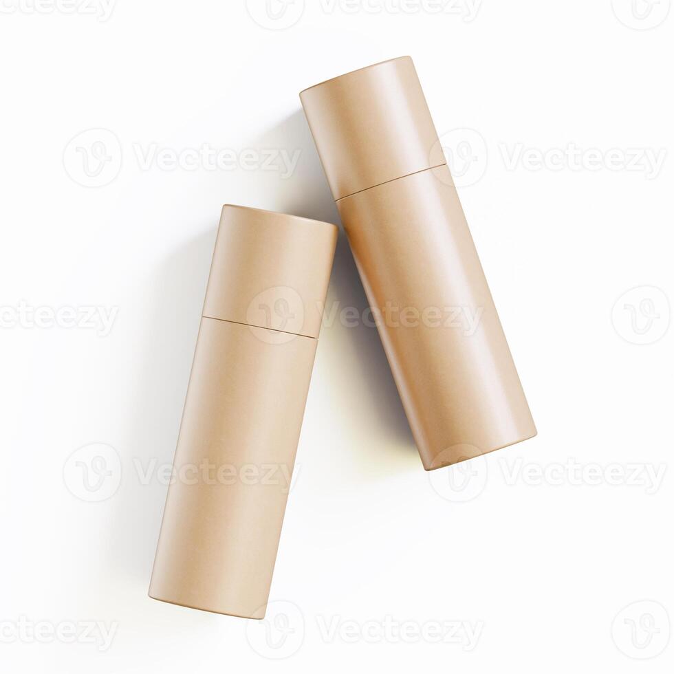 Two empty brown paper tubes on a white surface photo