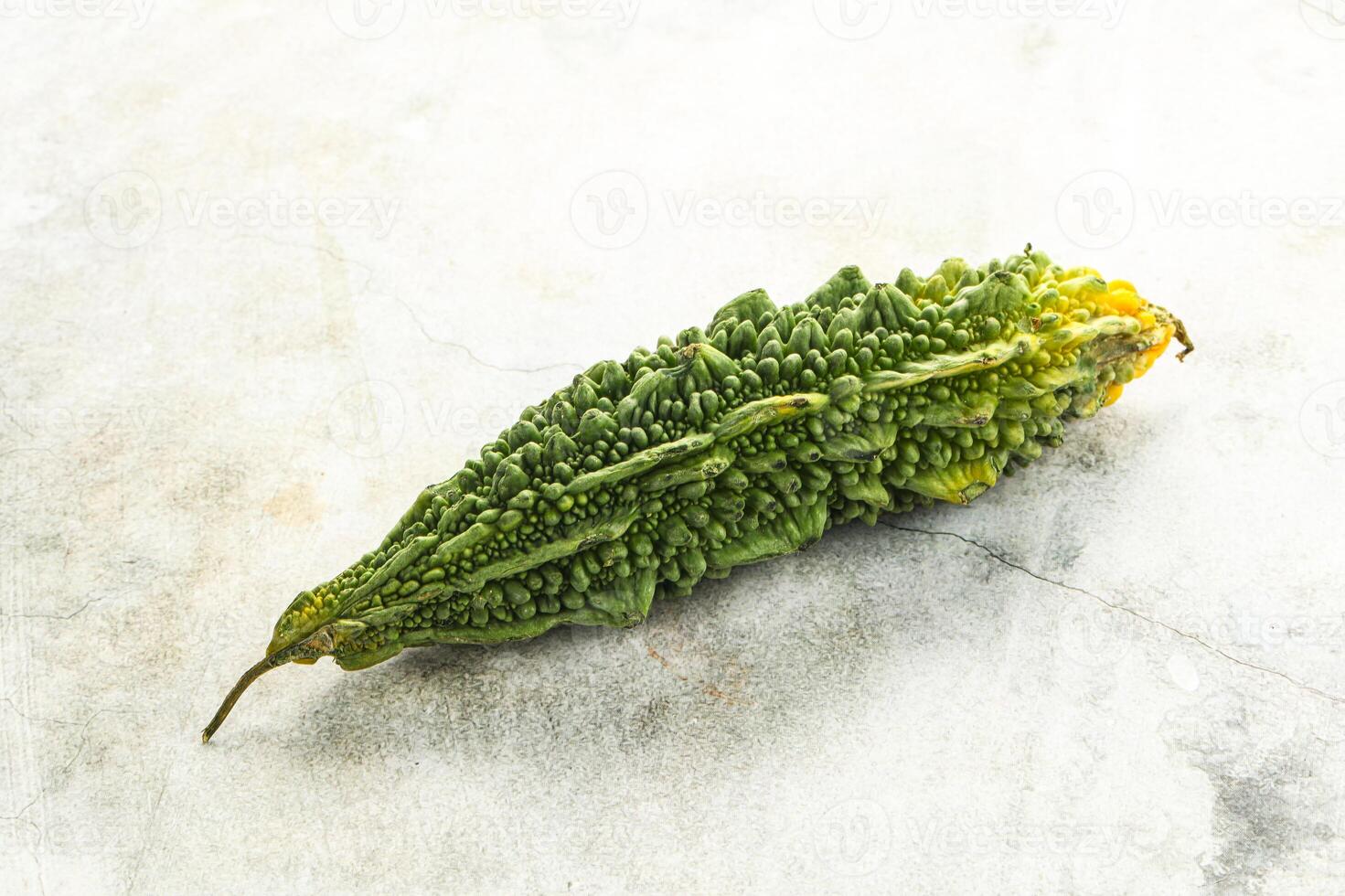 Raw green exotic tropical bitter melon photo