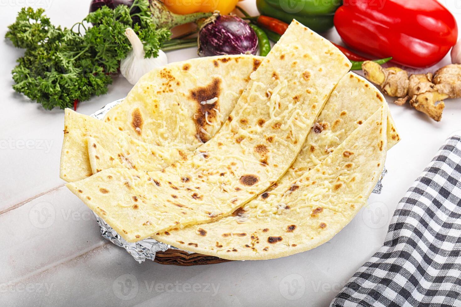 Indian bread cheese garlic naan photo
