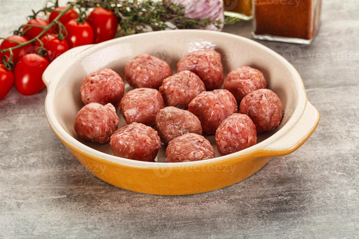 Uncooked raw beef meatball minced photo