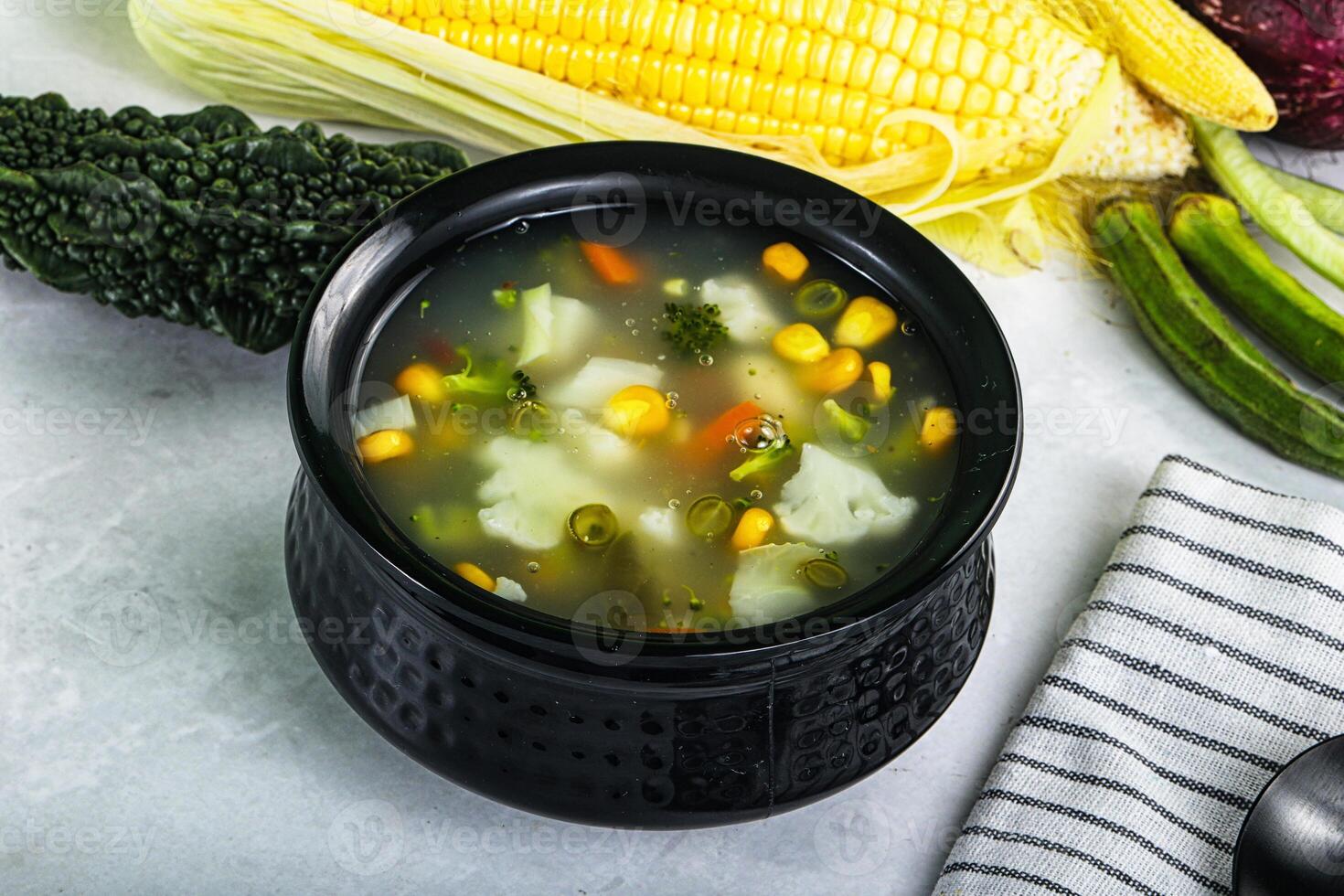 Soup with corn and broccoli photo