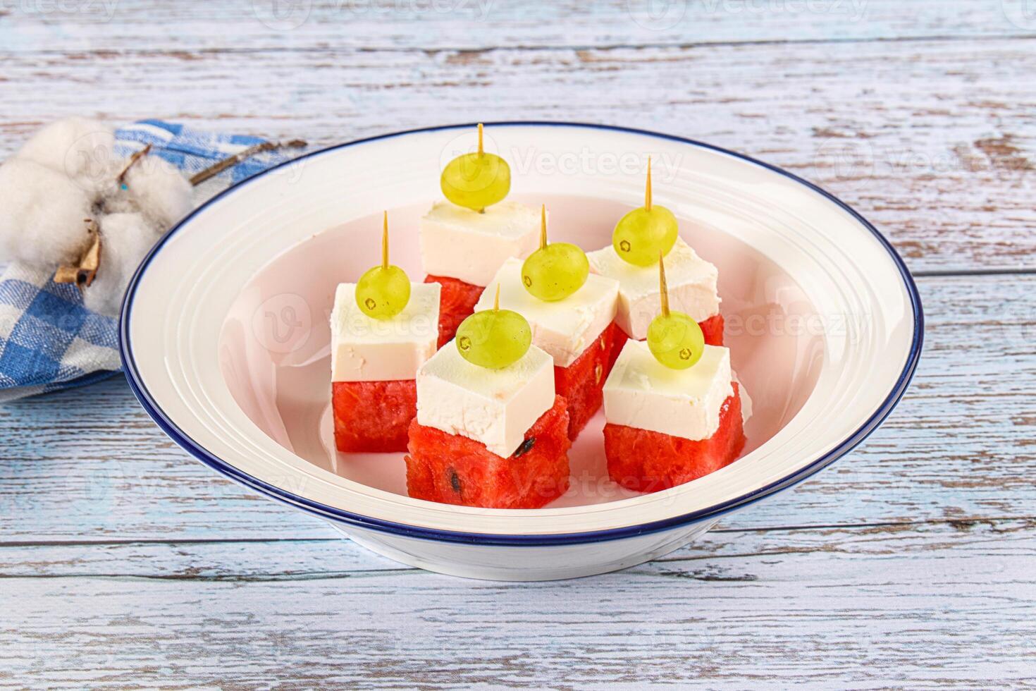 Watermelon with feta and grape photo