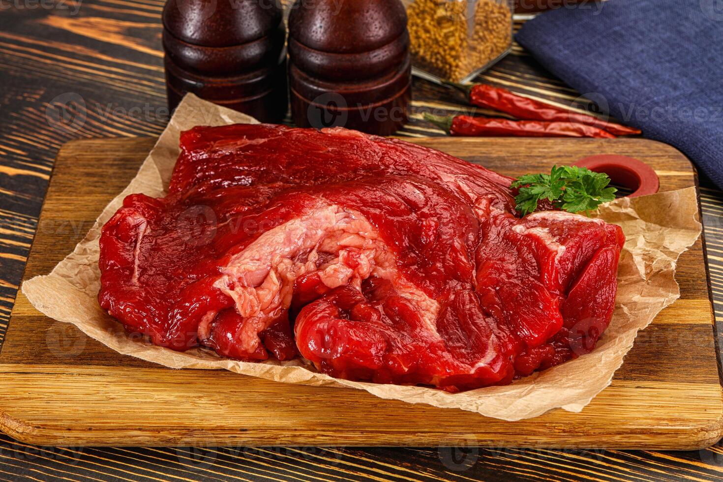 Raw beef meat piece for cooking photo