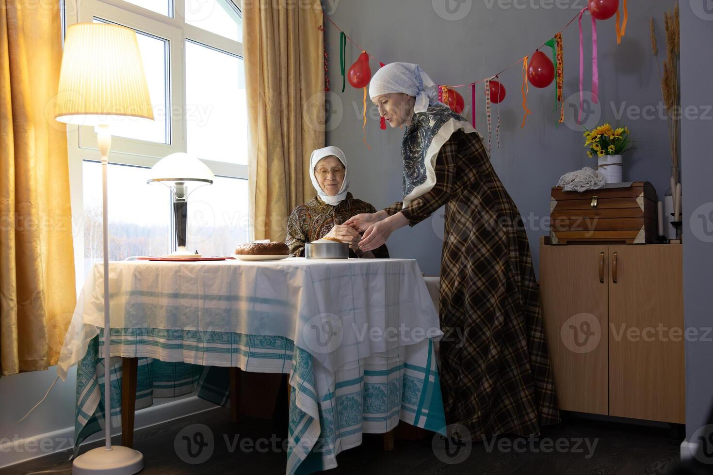 Two women in a room photo