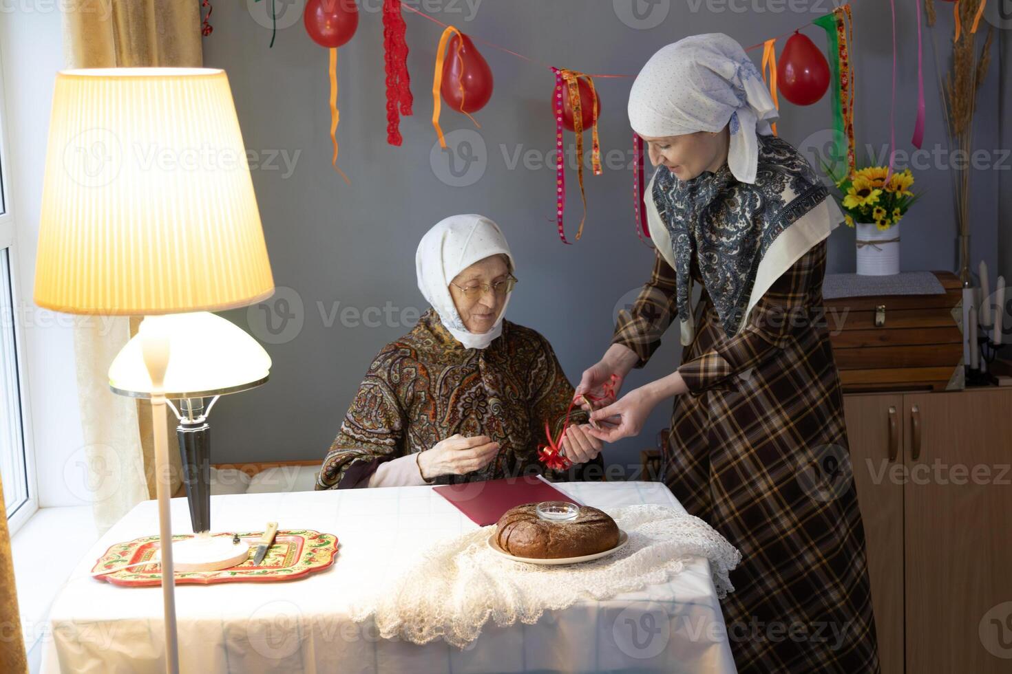 A woman wearing a head scarf photo