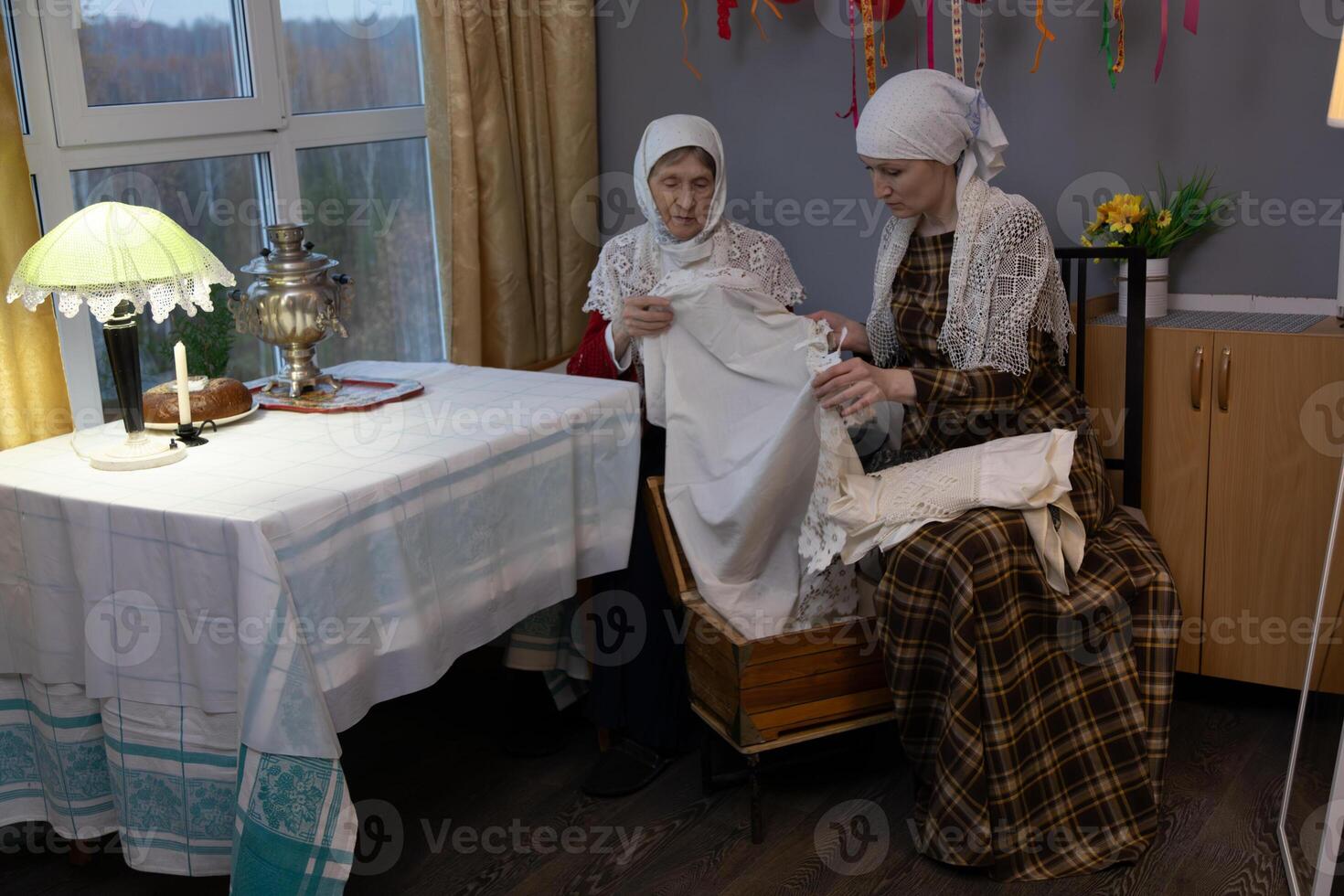 Two women sitting at a table photo