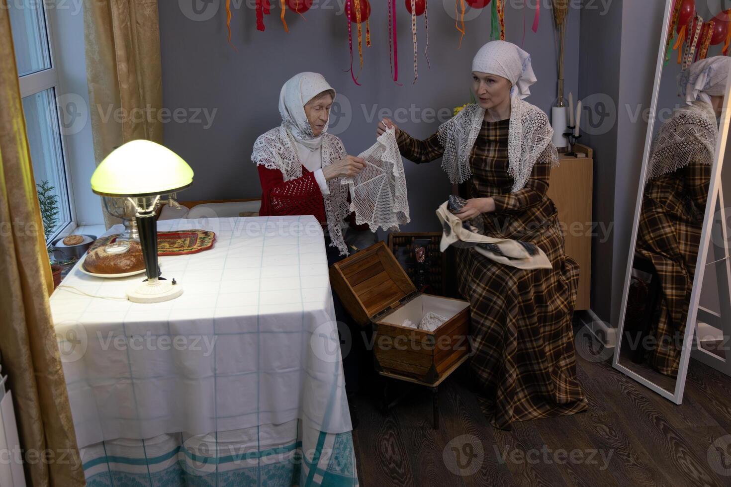 Two women in a room photo