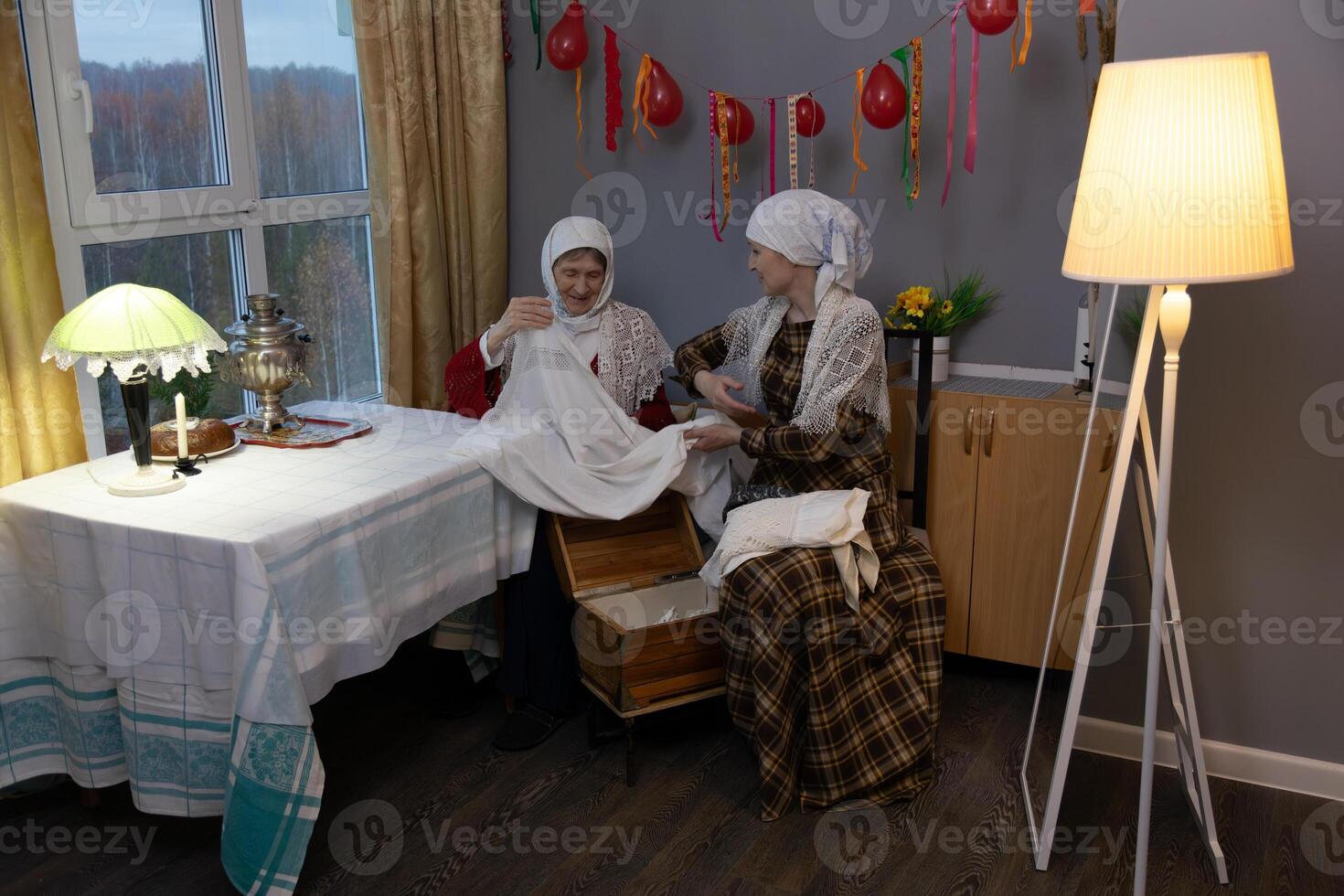 Two women sitting at a table photo