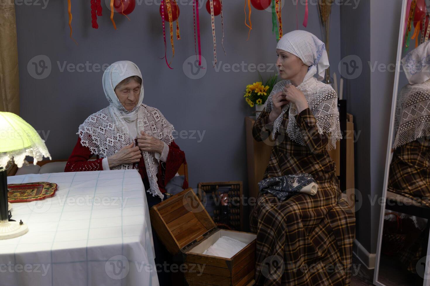 Two women sitting at a table photo