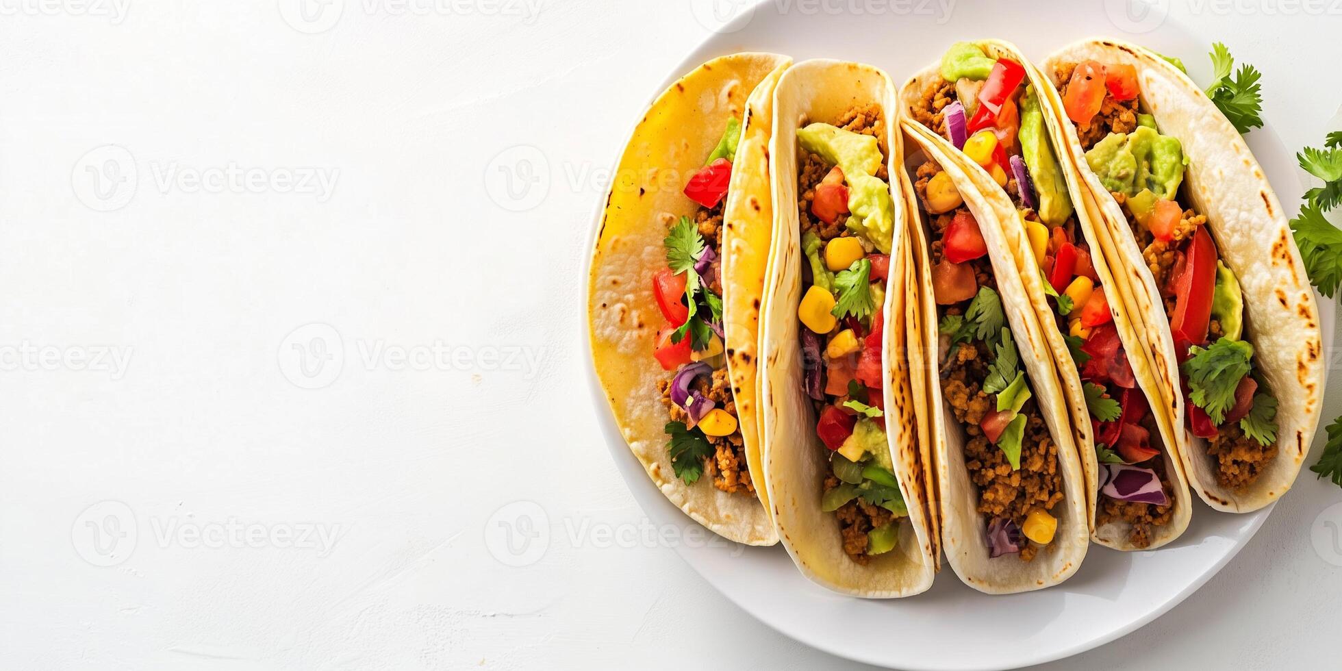 Top-down view of tacos with visible fillings, neatly arranged on a plain white dish, gastronomy photography photo