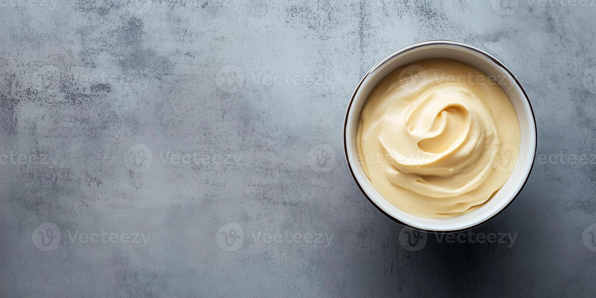Top-down view of mousse in a small bowl with an even surface, gastronomy photography photo