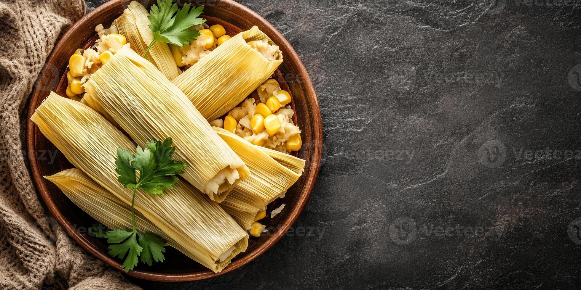 Top-down view of tamales with corn husks wrapped around the filling, neatly arranged on a dish, gastronomy photography photo