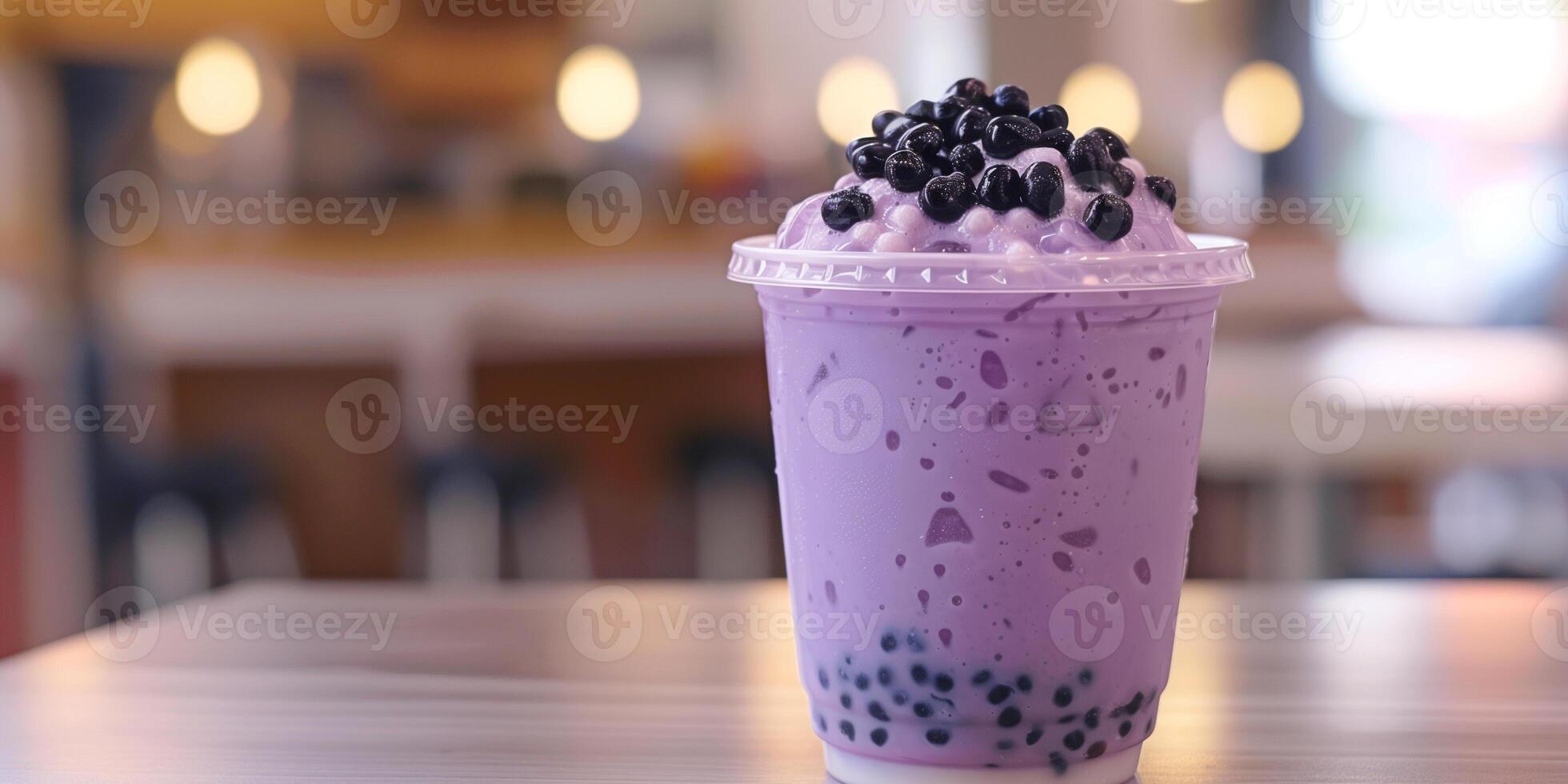 Plastic cup filled with purple taro-flavored drink, topped with black tapioca pearls, culinary photography photo
