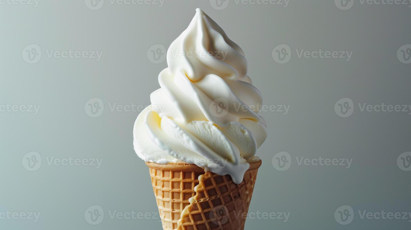 Swirl of soft-serve ice cream in a waffle cone, standing upright, food setting photo