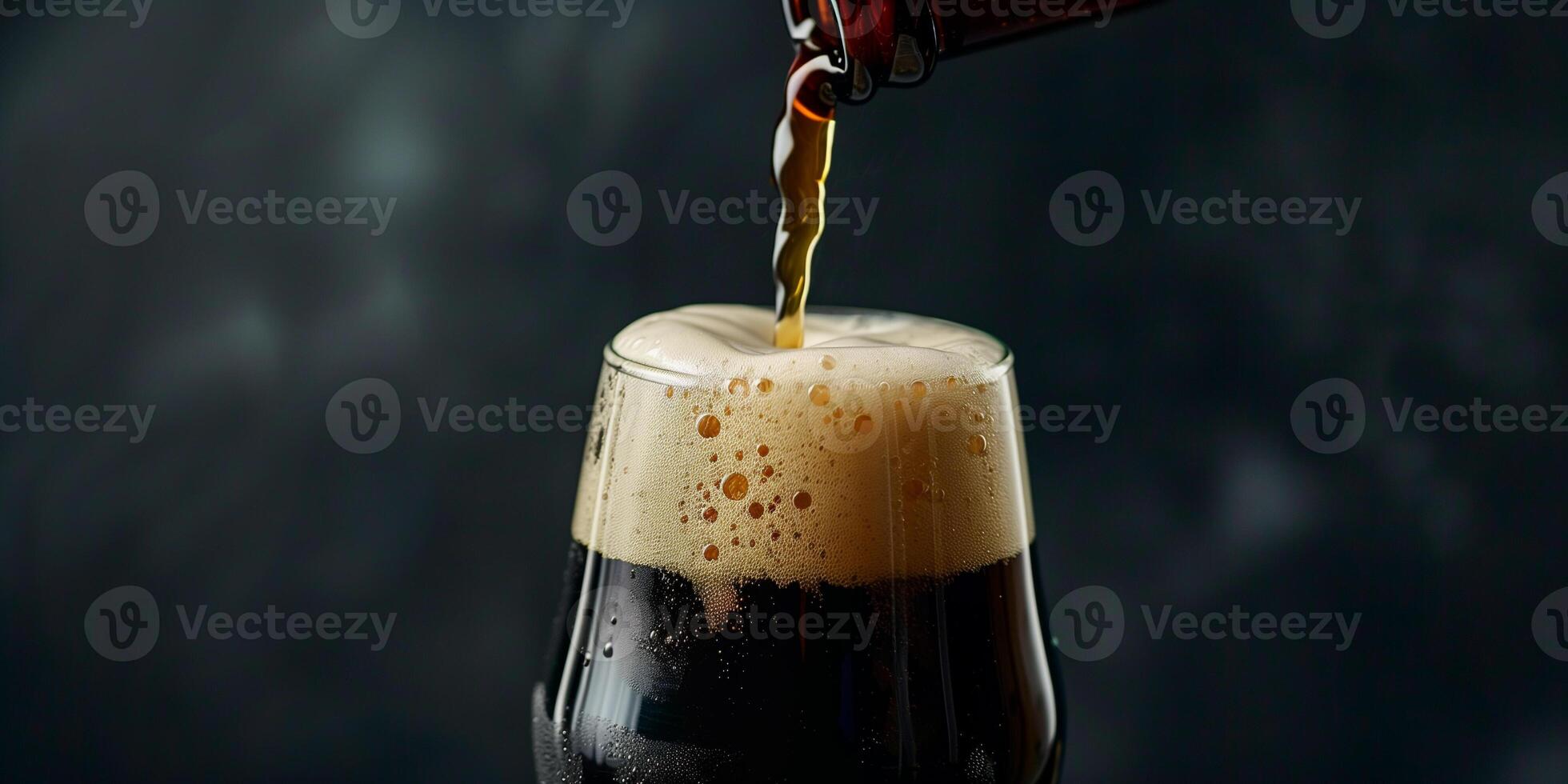 Stout beer being poured into a glass from a bottle, foam rising to the top, food setting photo