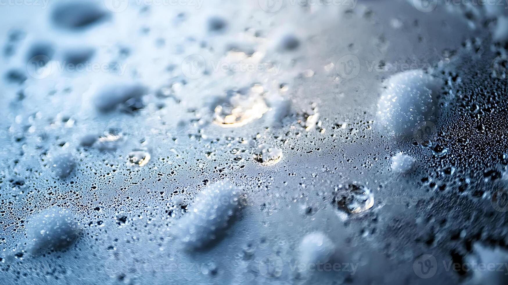 Water drops on a glass surface photo