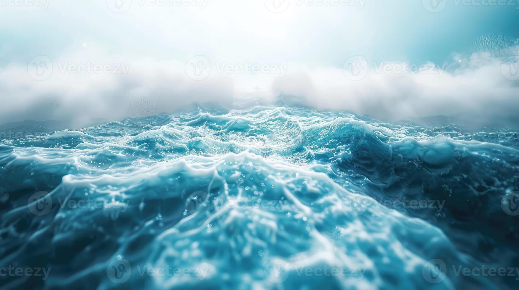 A large ocean wave with a bright sun in the background photo