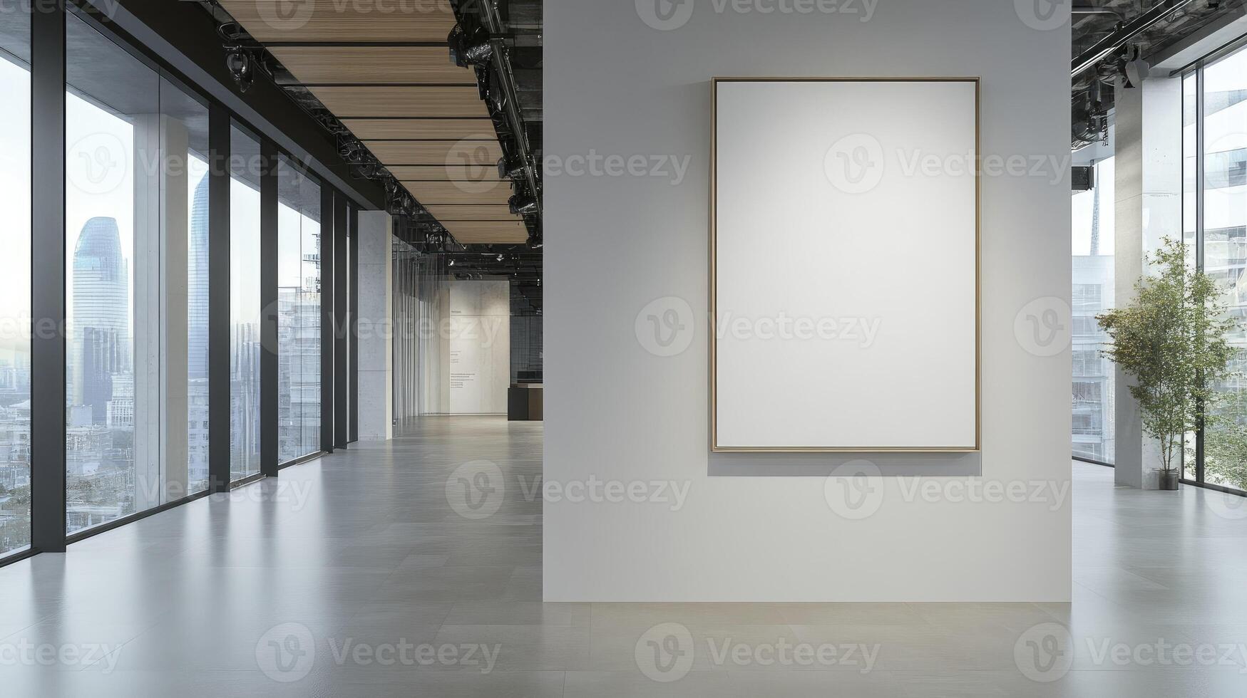 Empty white frame in a modern office with large windows photo