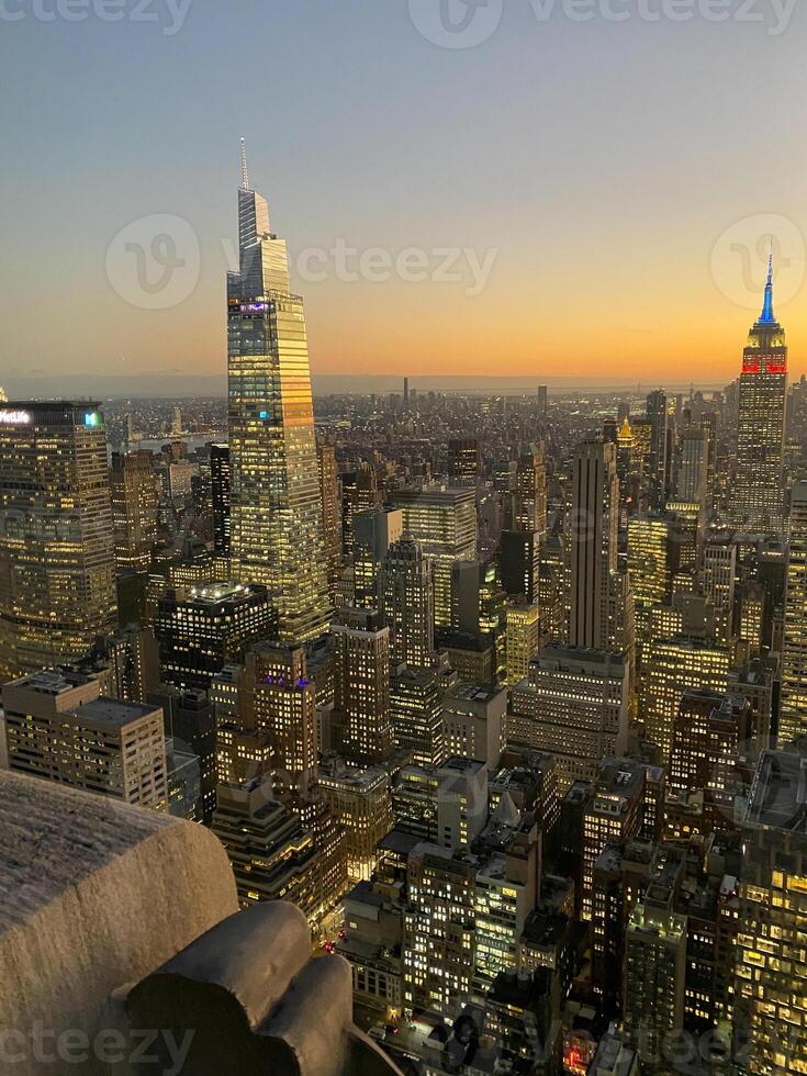 The view from the top of the empire state building at sunset photo