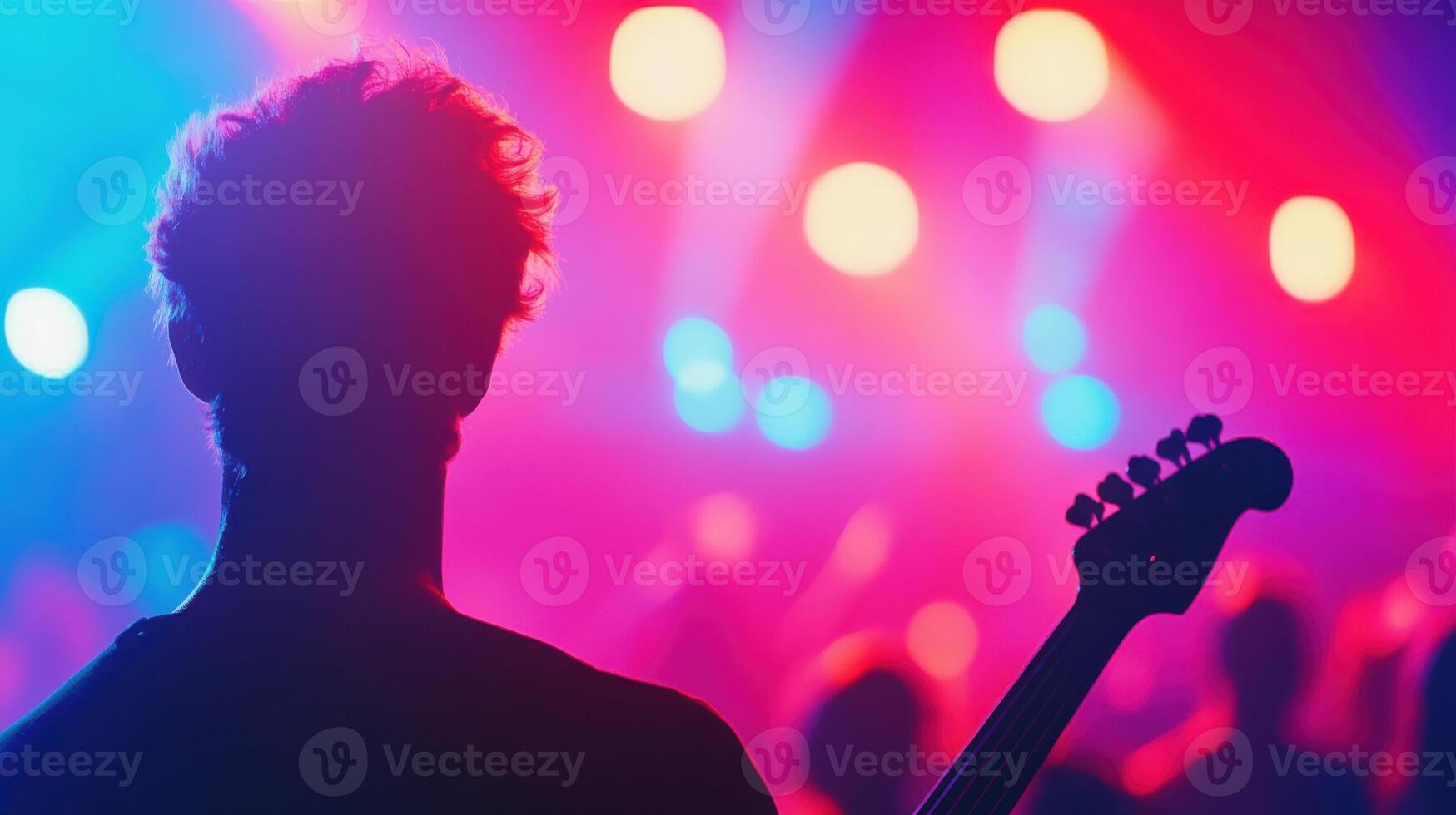 Energetic punk band performs in a vibrant concert atmosphere with neon lights and an enthusiastic crowd photo