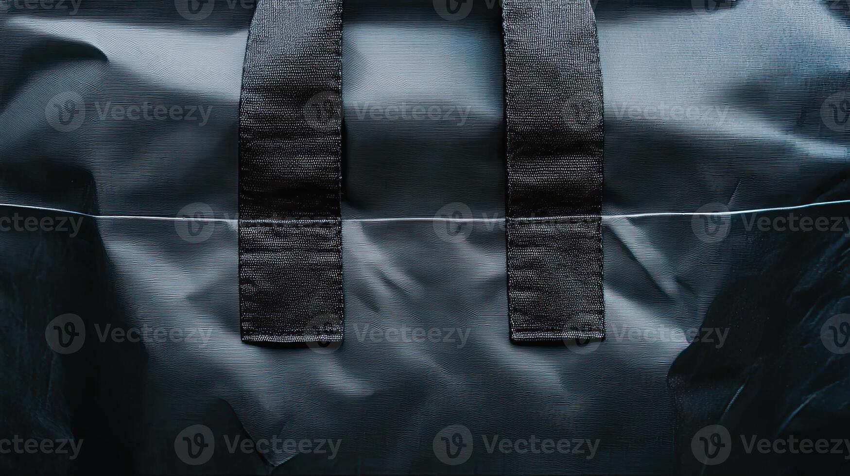 Close up of dark navy blue fabric tote bag handles. Concept of simple, durable, and practical. photo