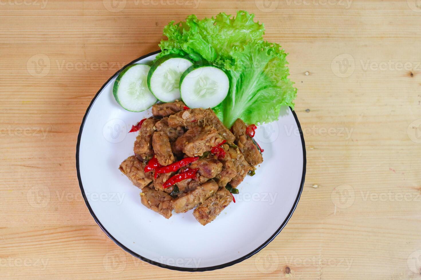 Indonesian Food - Tempeh Sweet Soy Sauce or Orek Tempe. Top View with Copy Space for Advertisement photo