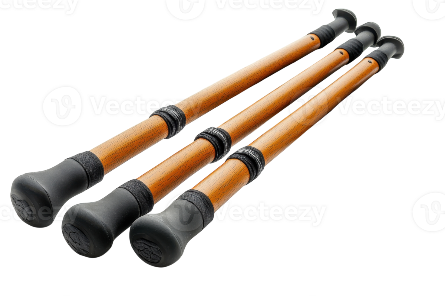 Hiking poles resting on stones in a natural setting ready for outdoor adventures png