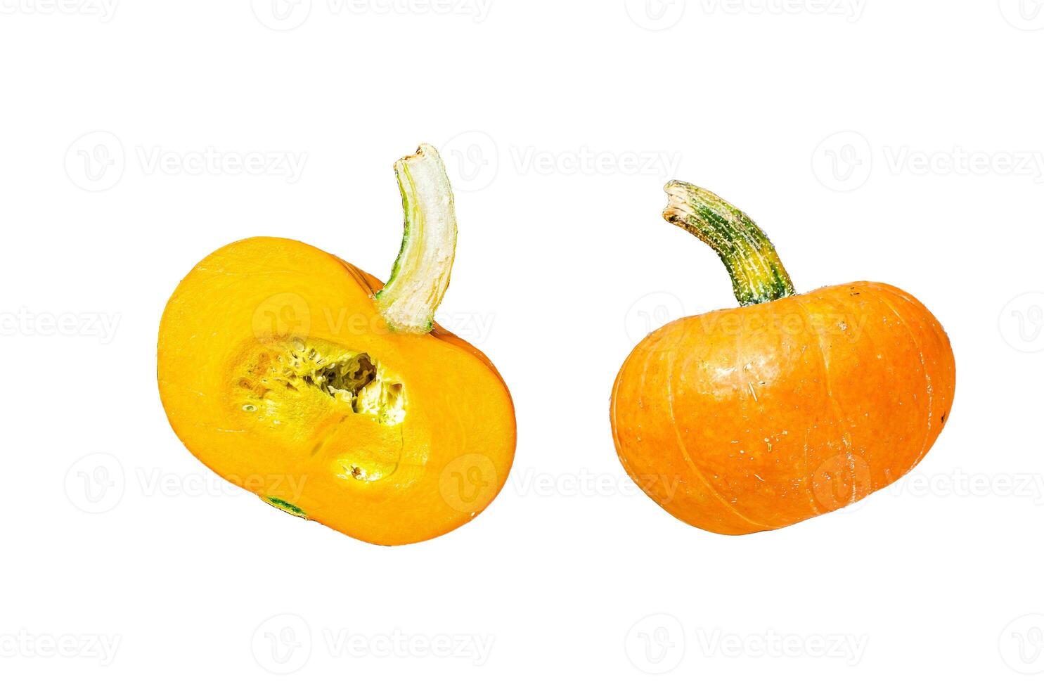 Slicing raw orange pumpkin. Isolated on white background. Top view. photo
