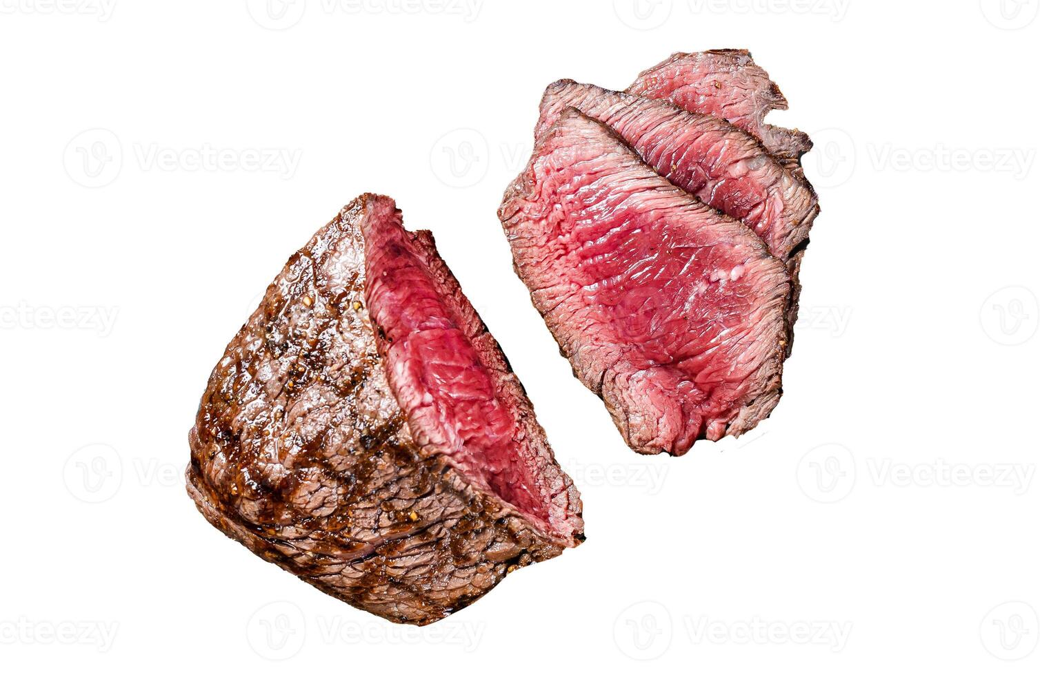 Grilled Rump sirloin steak sliced on a tray with herbs. Isolated, white background. photo