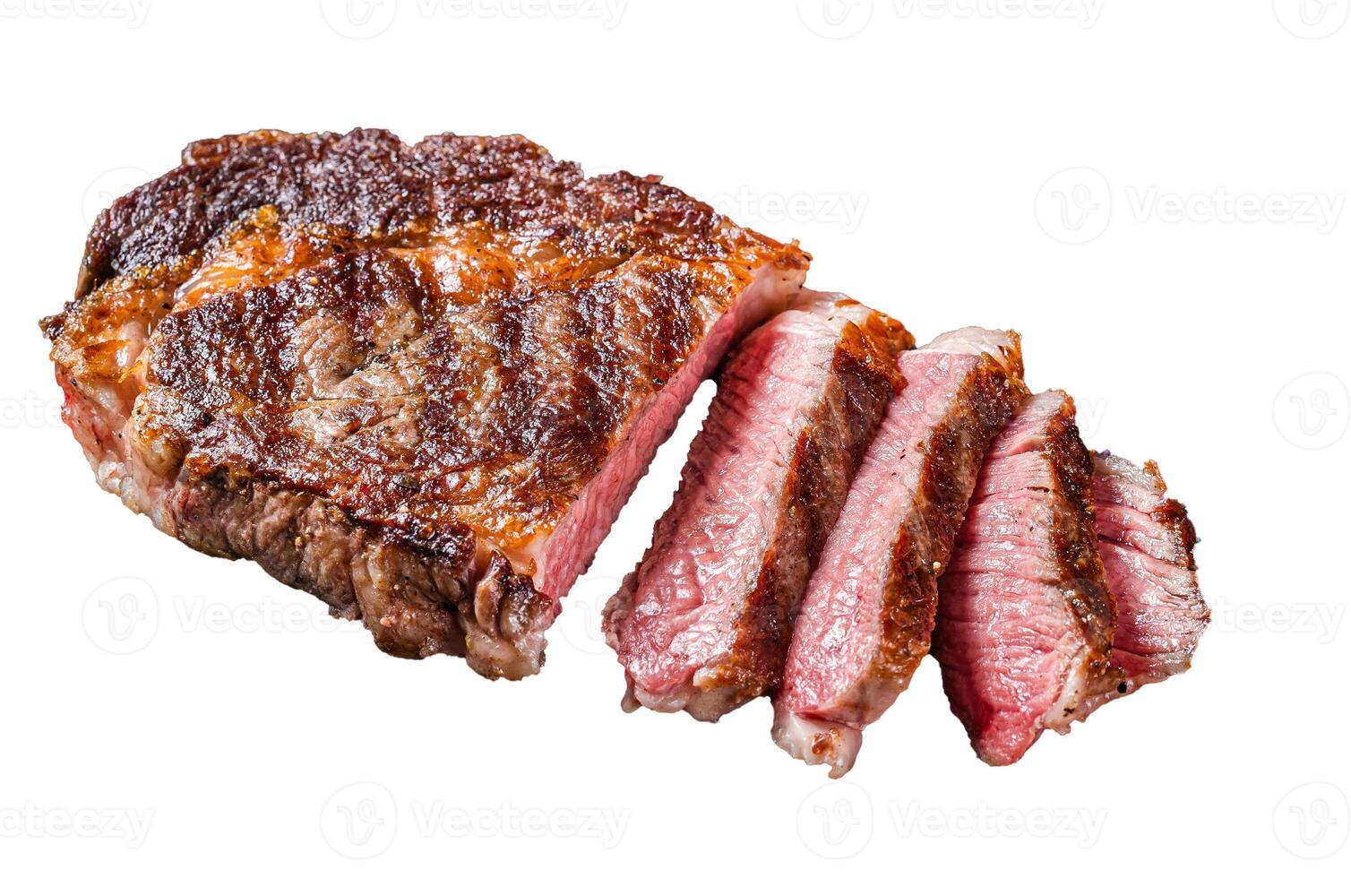 Grilled rib eye steak, ribeye beef marbled meat on a plate with tomato. Isolated on white background. photo