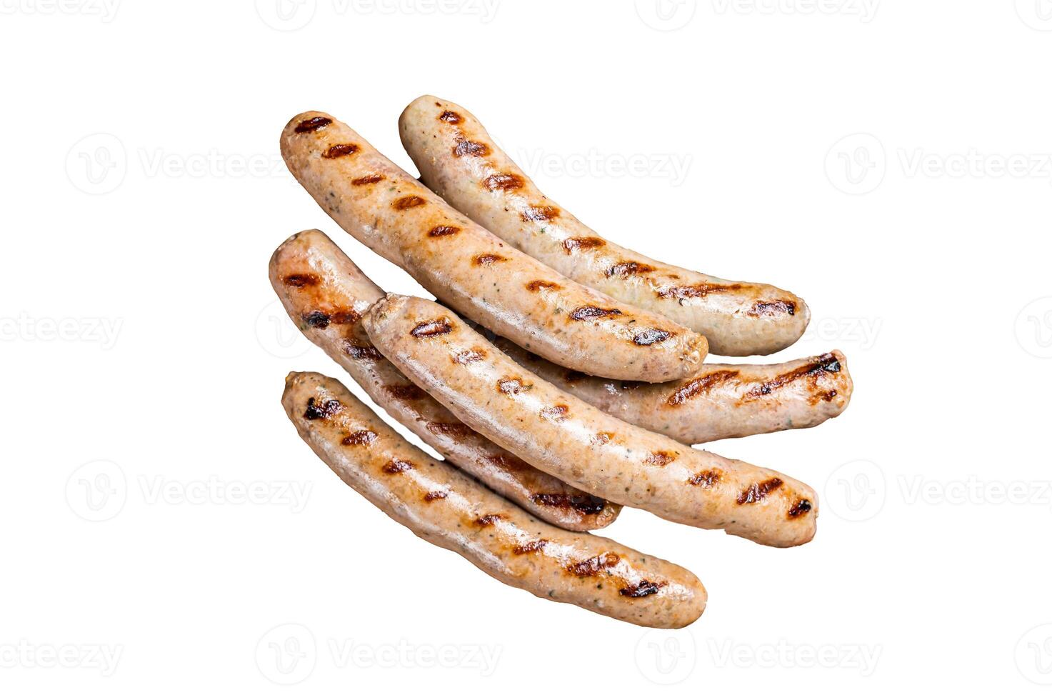 Grilled pork sausages from a BBQ. Isolated on white background. photo