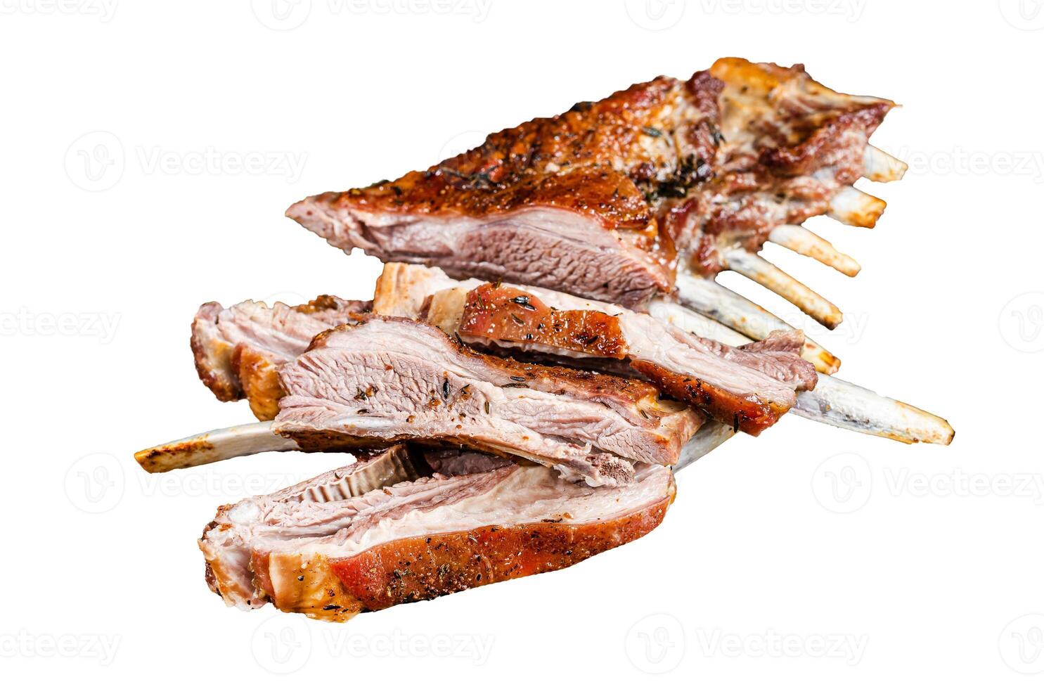 Roast lamb ribs, mutton spareribs, sliced meat on wooden board. Isolated, white background. photo