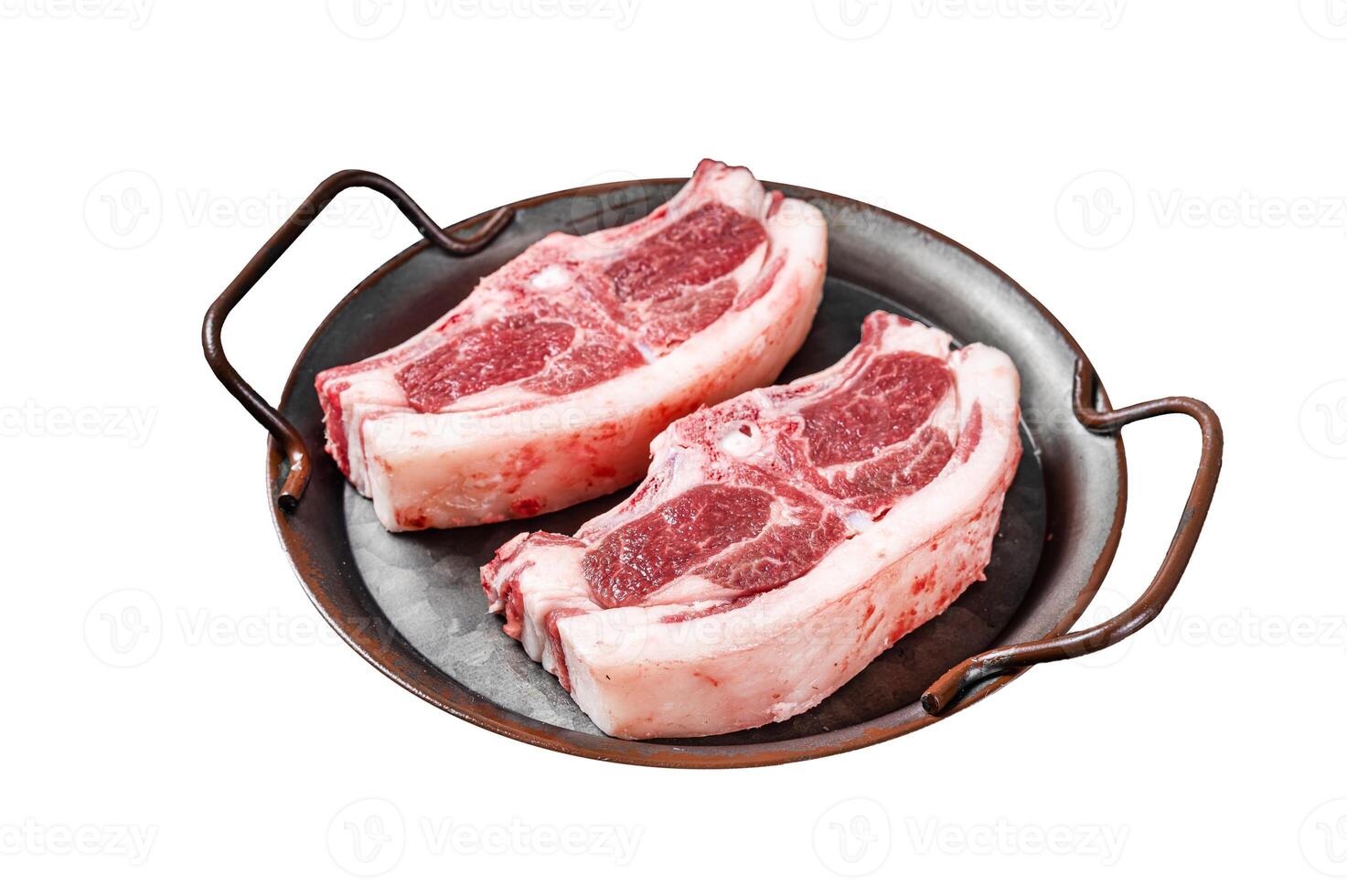 Raw fresh lamb loin chops with herbs and spices in steel tray. Isolated on white background. photo