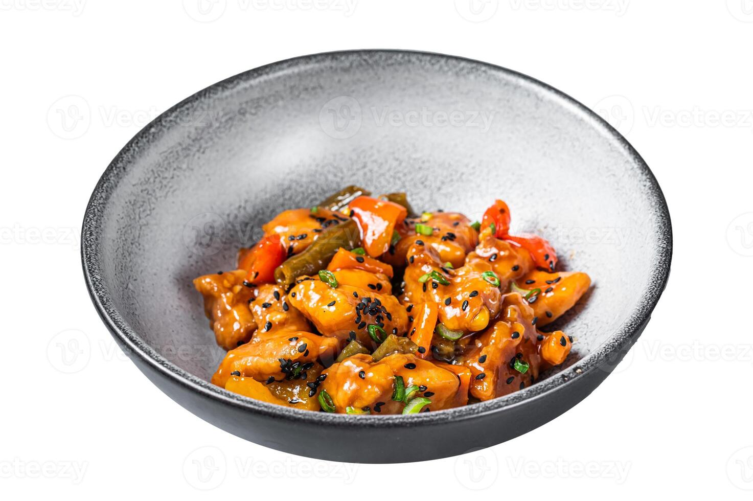 Chinese Sweet and Sour Pork guo bao rou in a bowl. Isolated on white background. Top view. photo