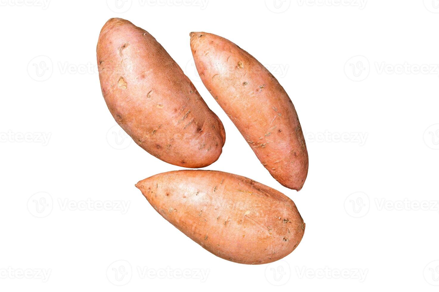 Raw sweet potatoes on kitchen table, fresh batata. Isolated on white background. photo