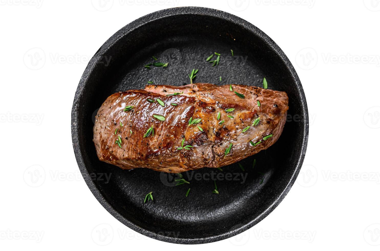 Fried lamb leg meat steak in a pan. Isolated on white background. photo